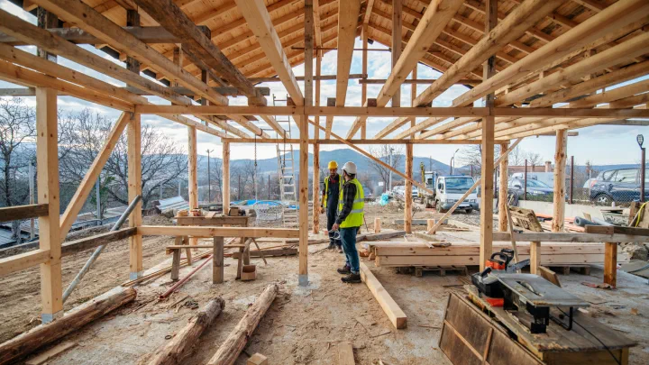 Construction workers at a site in the morning