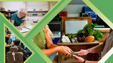 Small business owners working with clients
